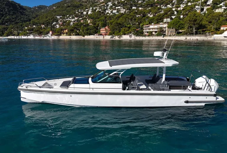 Axopar 37 Sun Top 2020 for sale — starboard profile at anchor on the French Riviera