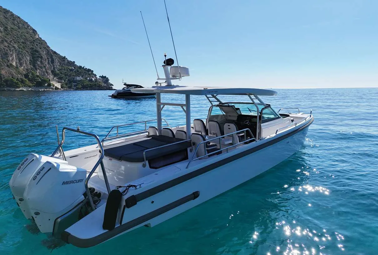 Axopar 37 Sun Top 2020 — stern quarter with twin Mercury Verado V8 outboards