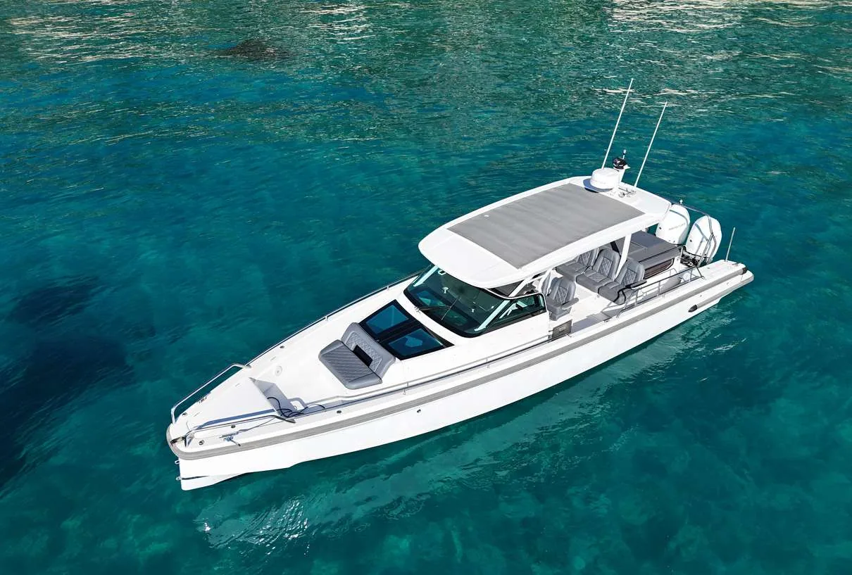Axopar 37 Sun Top 2020 — aerial view over clear water