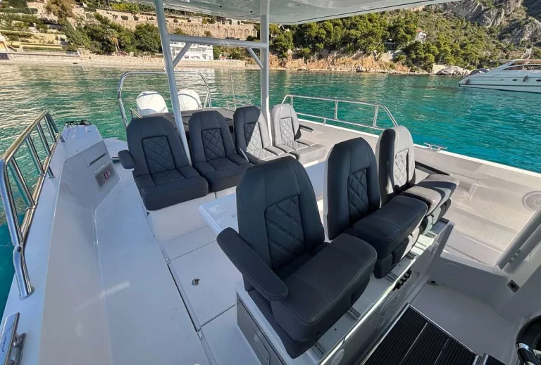 Axopar 37 Sun Top 2020 — cockpit seating looking aft under the sun top
