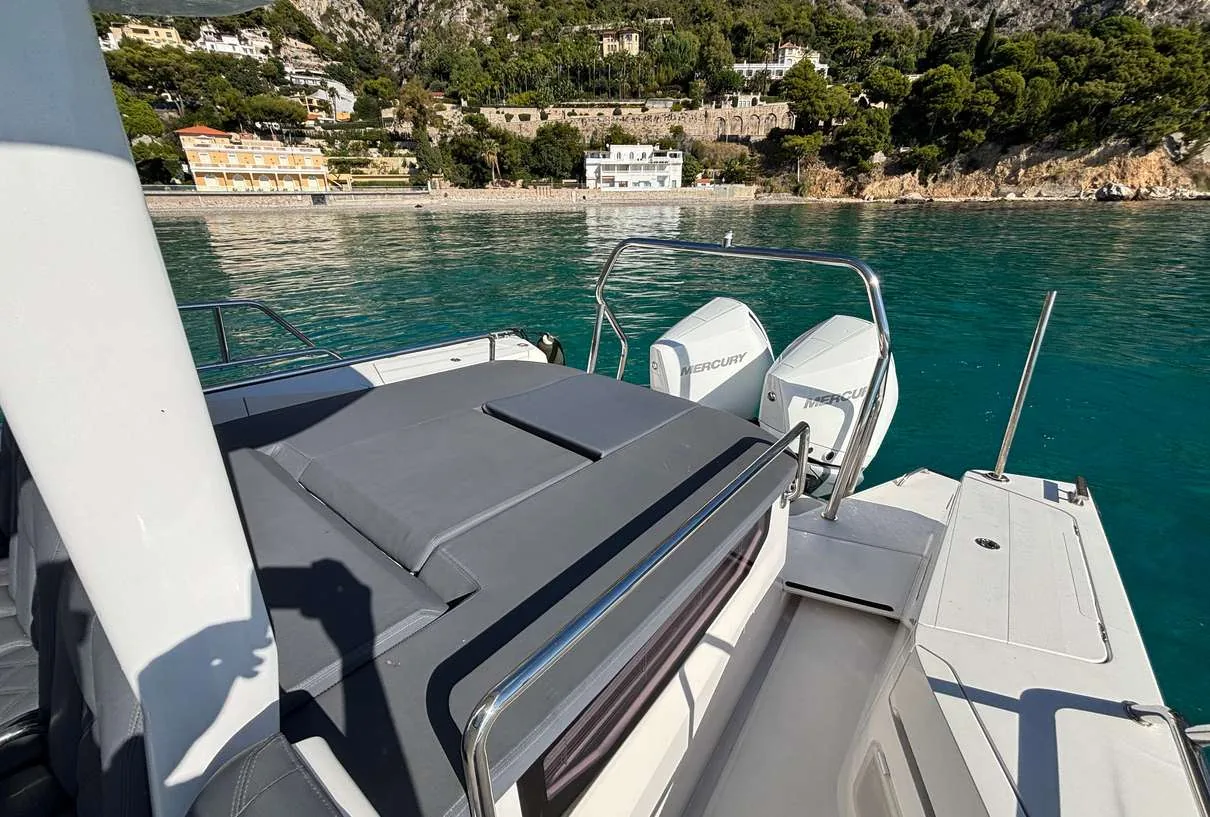 Axopar 37 Sun Top 2020 — aft deck and twin Mercury outboards