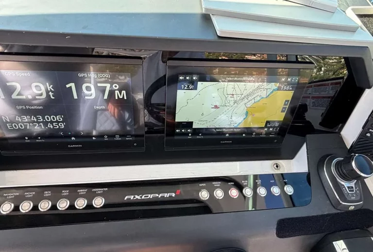 Axopar 37 Sun Top 2020 — twin Garmin chartplotters and switch panel